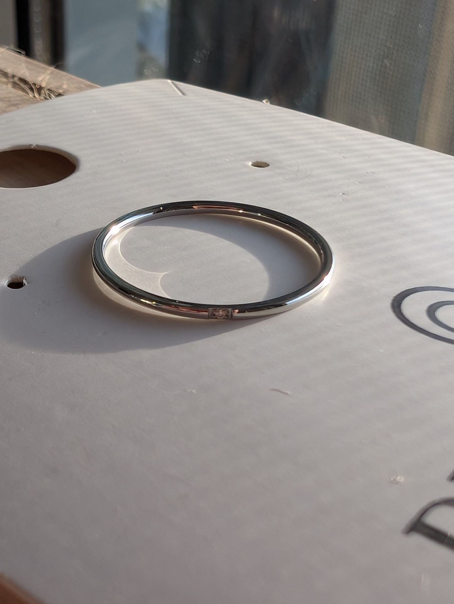 One lil diamond ring